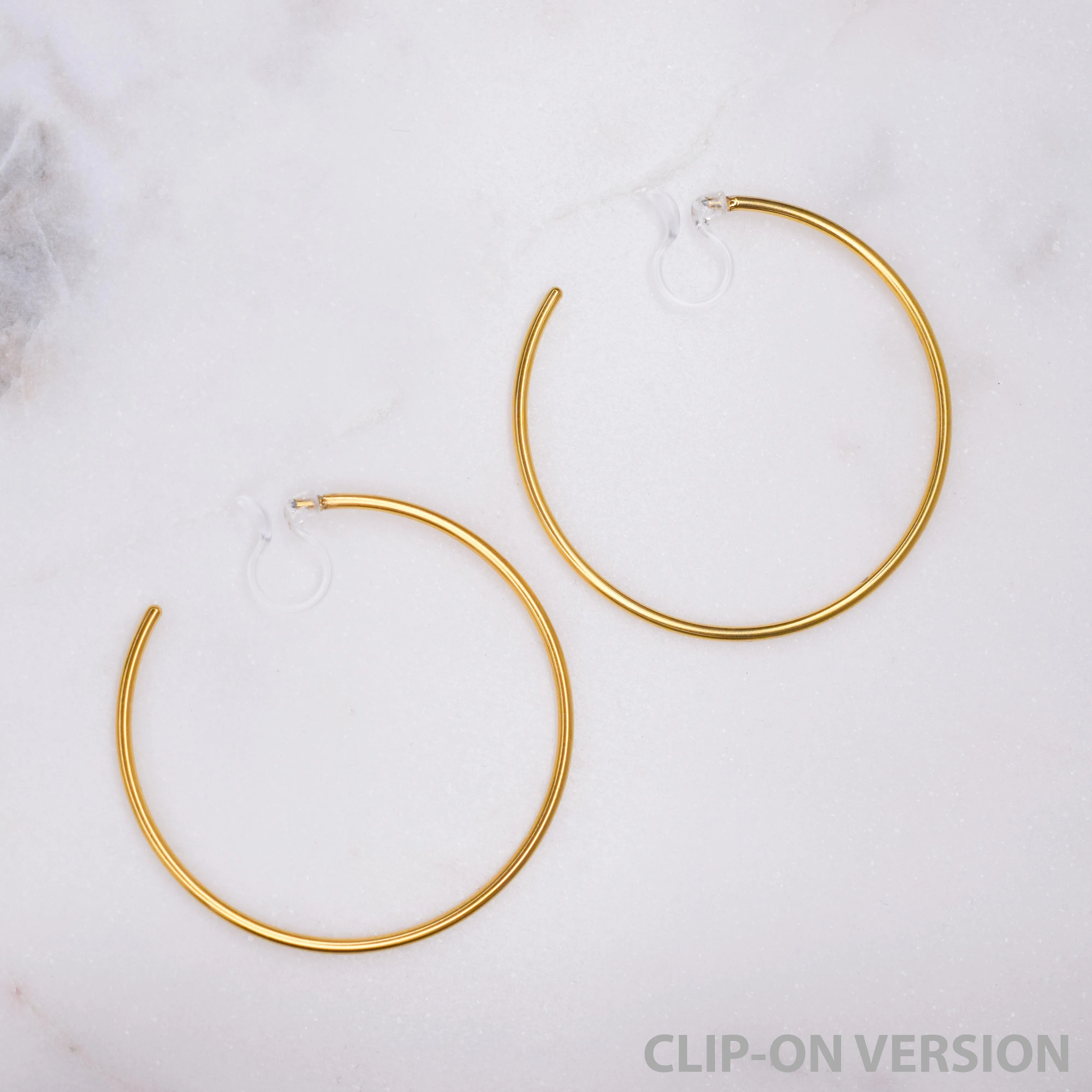 LARGE HOOP CLIP-ON EARRINGS IN GOLD